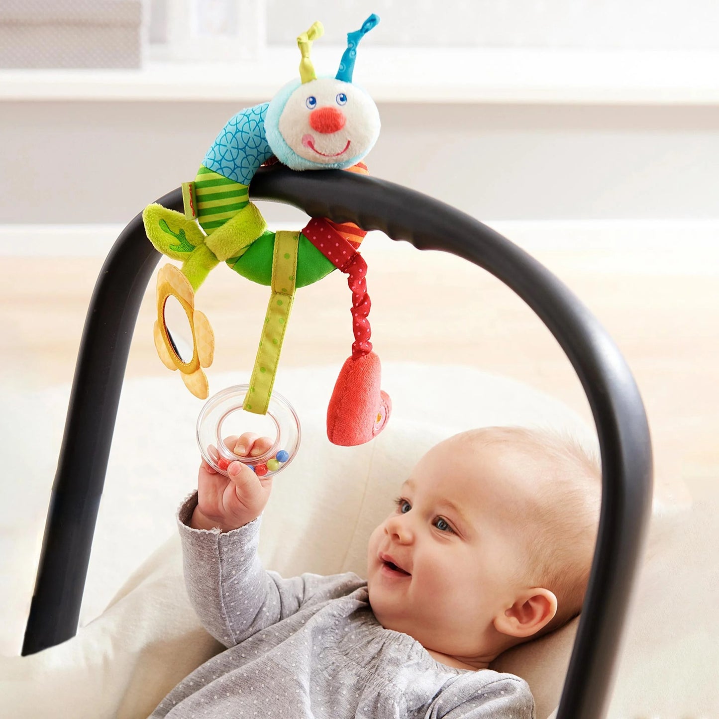 HABA Rainbow Worm Clutching Figure | Plush Ring with Dangling